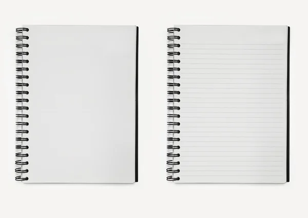 Twee laptops papier spiraal — Stockfoto