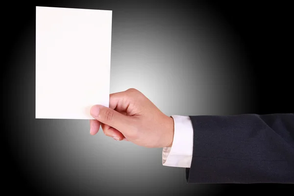 Business man holding blank white card — Stock Photo, Image