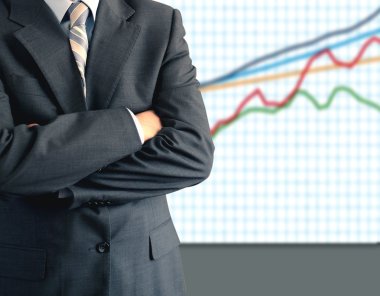 işadamı grafik önünde
