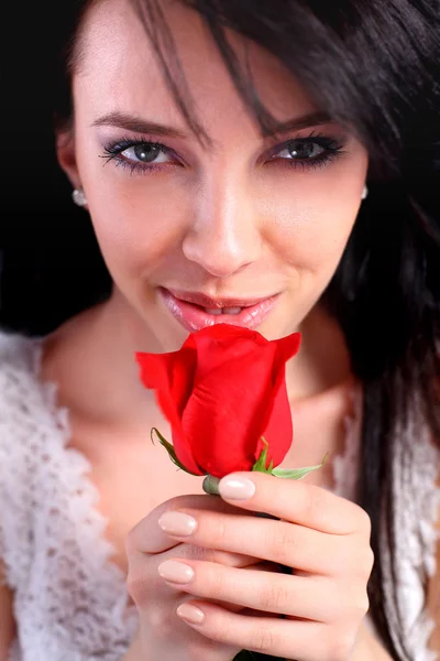Sexy woman holding a rose — Stock Photo, Image
