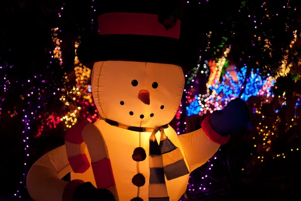 stock image Snowman and christmas lights