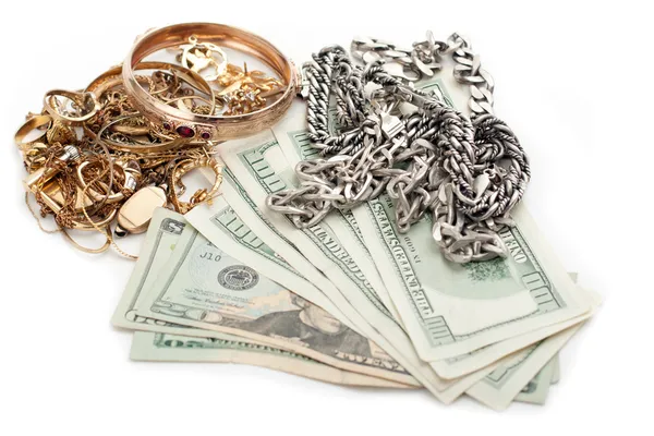 Золота і срібна купа металобрухту і готівковий долар Стокове Зображення