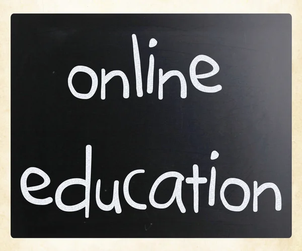 "Online education" handwritten with white chalk on a blackboard — Stock Photo, Image