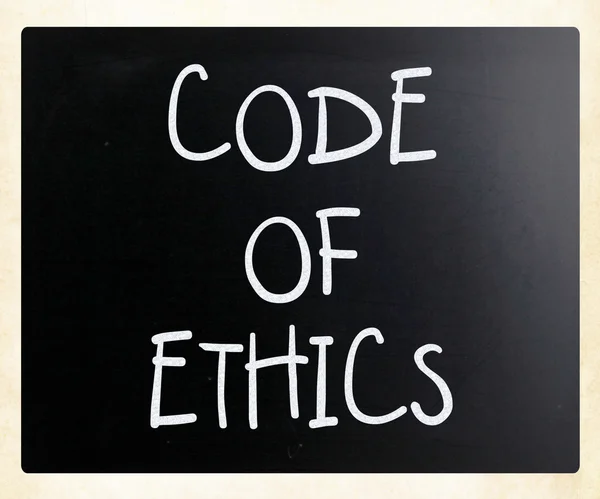 "Code of ethics" handwritten with white chalk on a blackboard — Stock Photo, Image