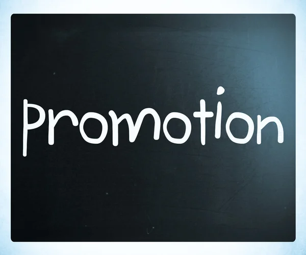 Das Wort "Promotion" handgeschrieben mit weißer Kreide auf einem schwarzen Eber — Stockfoto