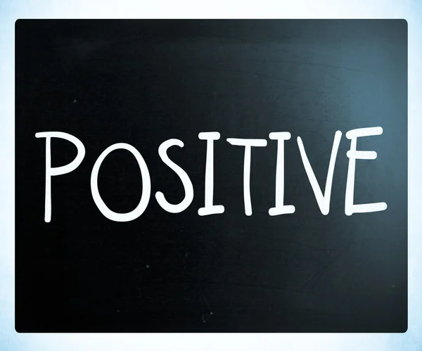 "Positive" handwritten with white chalk on a blackboard — Stock Photo, Image