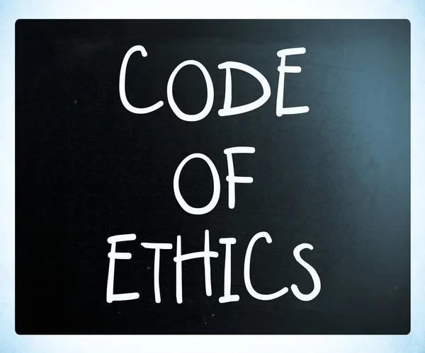 "Code of ethics" handwritten with white chalk on a blackboard — Stock Photo, Image