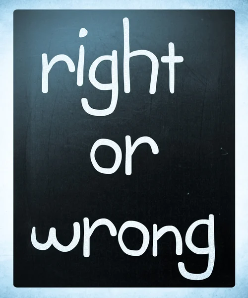 "Right or wrong" handwritten with white chalk on a blackboard — Stock Photo, Image