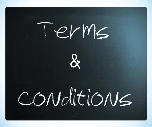 "Terms & Conditions" handwritten with white chalk on a blackboar — Stock Photo, Image