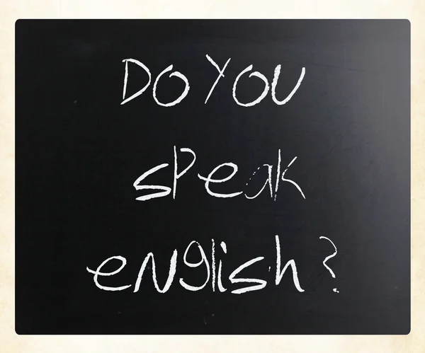 "Do you speak english "handwritten with white chalk on a blackbo — стоковое фото