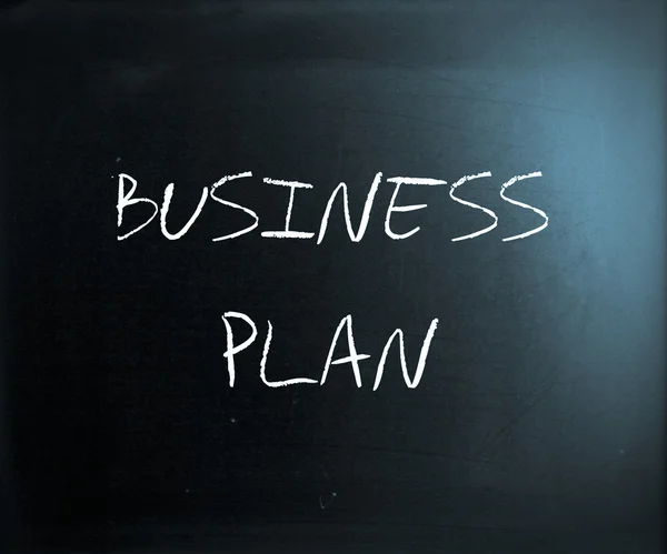 "黒板に白いチョークで手書きの「事業計画」 — ストック写真