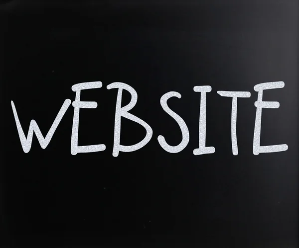 "Website" handwritten with white chalk on a blackboard — Stock Photo, Image
