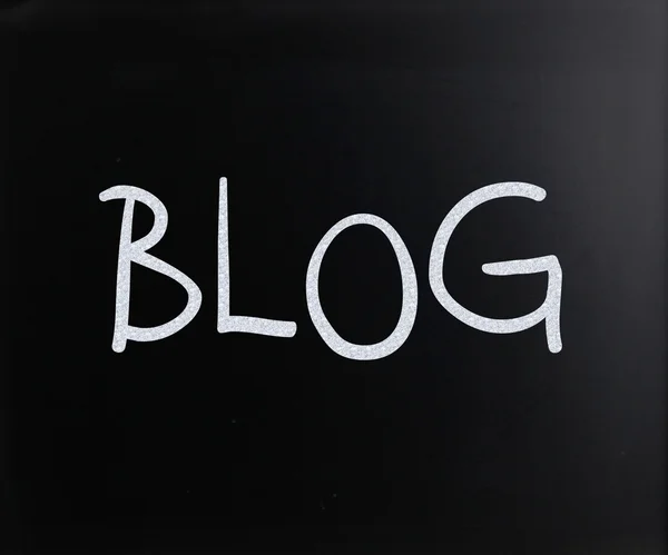 "Blog" handwritten with white chalk on a blackboard — Stock Photo, Image