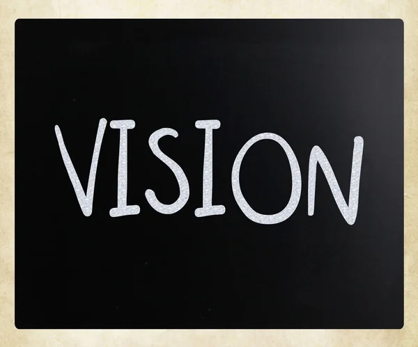 "Vision "handwritten with white chalk on a blackboard — стоковое фото