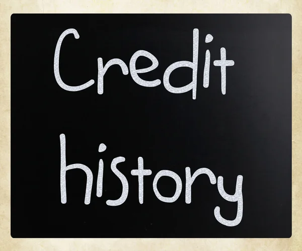 "Storia del credito "scritto a mano con gesso bianco su lavagna — Foto Stock