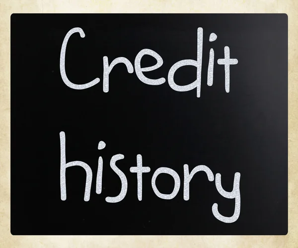 "Credit history" handwritten with white chalk on a blackboard — Stock Photo, Image