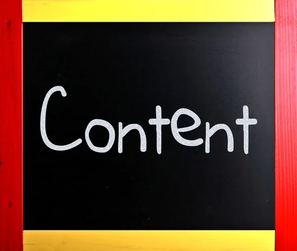 The word "Content" handwritten with white chalk on a blackboard — Stock Photo, Image