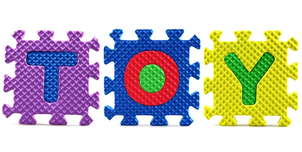 Alphabet puzzle pieces on white background — Stock Photo, Image