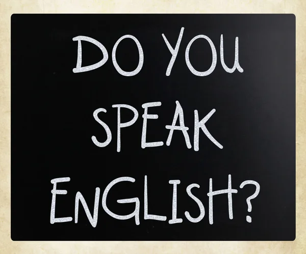 "Parli inglese "scritto a mano con gesso bianco su un blackbo — Foto Stock