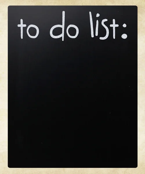 "Seznam do seznamu "ručně psaný bílou křídou na tabuli — Stock fotografie