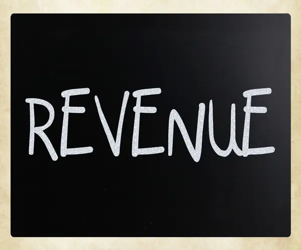 "Revenue" handwritten with white chalk on a blackboard — Stock Photo, Image