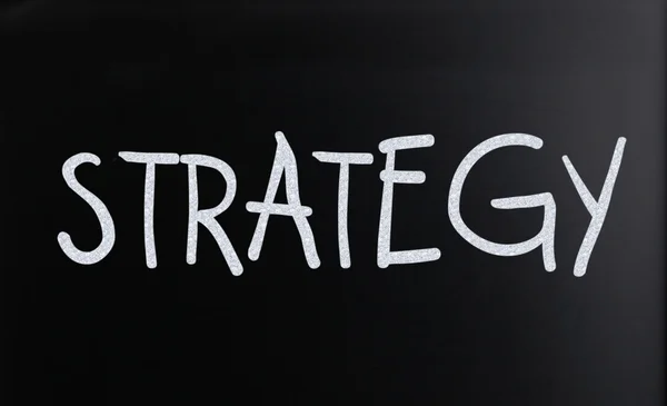 The word "Strategy" on a blackboard — Stock Photo, Image
