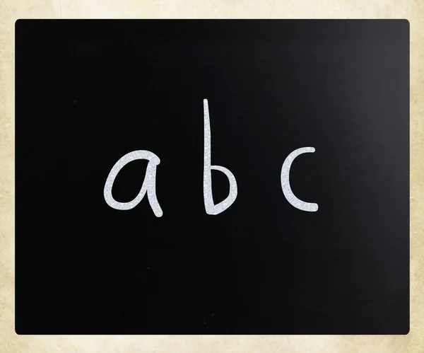 "abc" handwritten with white chalk on a blackboard — Stock Photo, Image