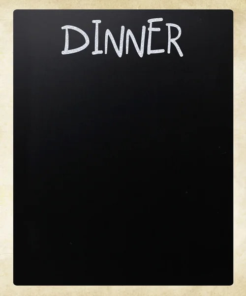 "Middag "handskriven med vit krita på en svart tavla — Stockfoto