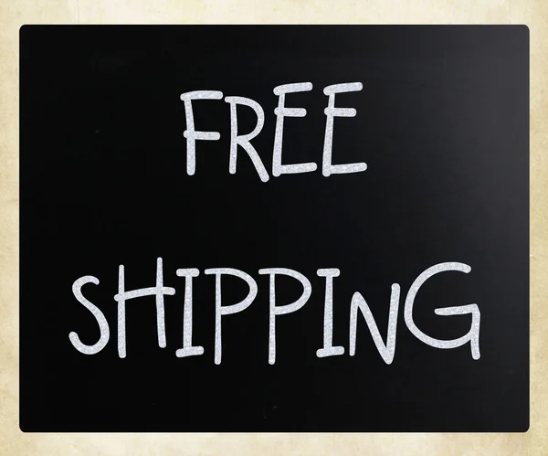 "Free shipping" handwritten with white chalk on a blackboard — Stock Photo, Image