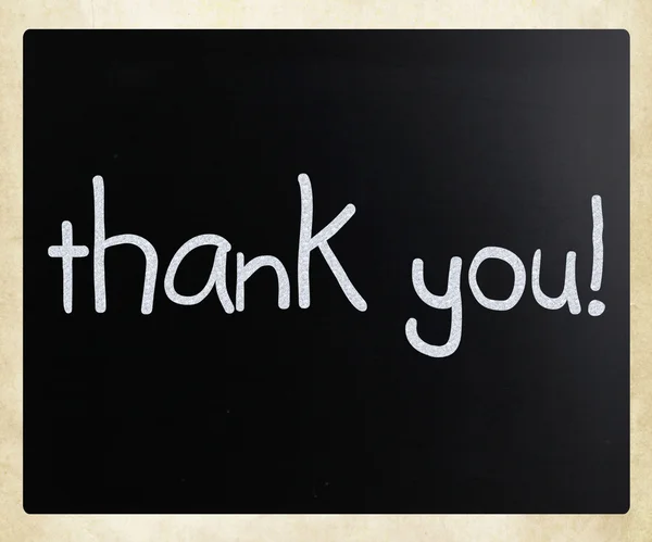 "Tack "handskriven med vit krita på en svart tavla — Stockfoto