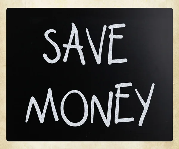 "Save money "handwritten with white chalk on a blackboard — стоковое фото