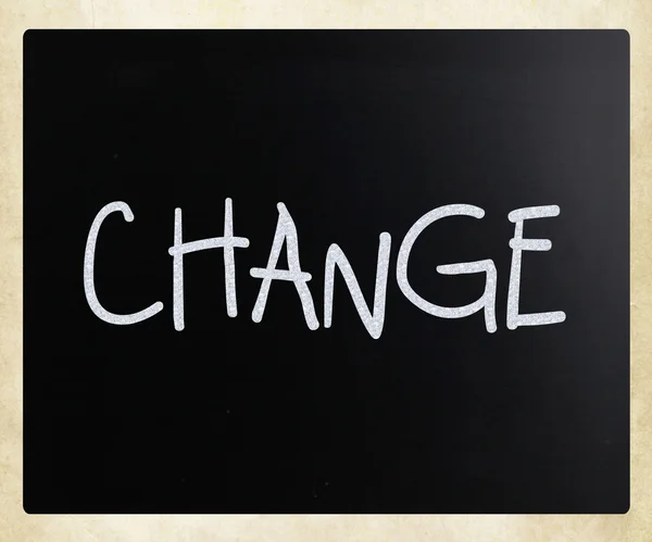 "Změnit "vlastnoručně psaný bílou křídou na tabuli — Stock fotografie