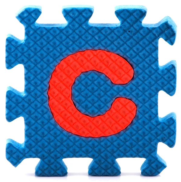 Piese de puzzle alfabet — Fotografie, imagine de stoc