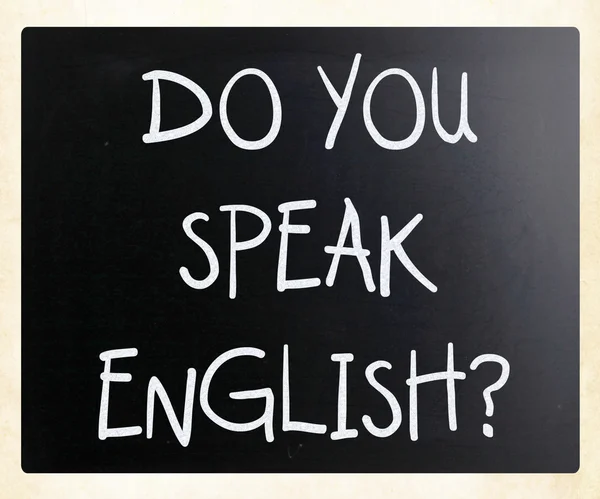 "Parli inglese "scritto a mano con gesso bianco su un blackbo — Foto Stock