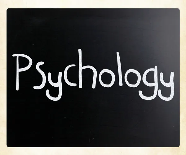 Слово "психология" написано от руки белым мелом на черном боа — стоковое фото