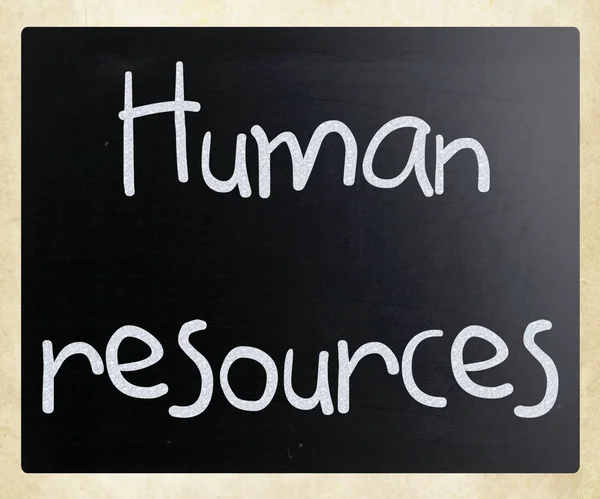 The word 'Human resources' handwritten with white chalk on a bla — Stock Photo, Image