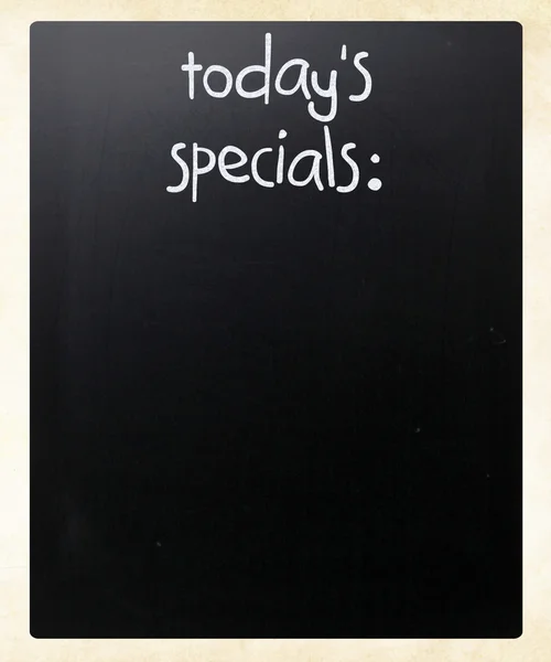 "Dnešní speciality "psané bílou křídou na tabuli — Stock fotografie
