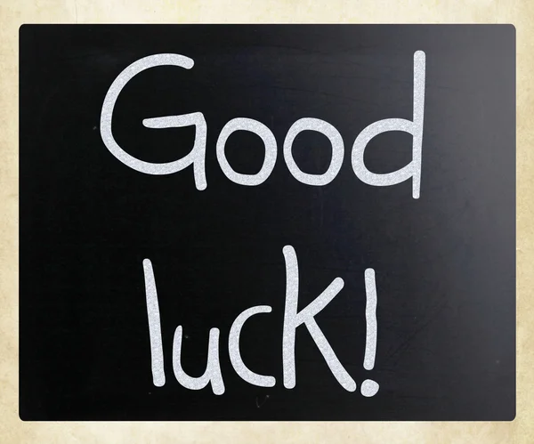"Lycka till! "handskriven med vit krita på en svart tavla — Stockfoto