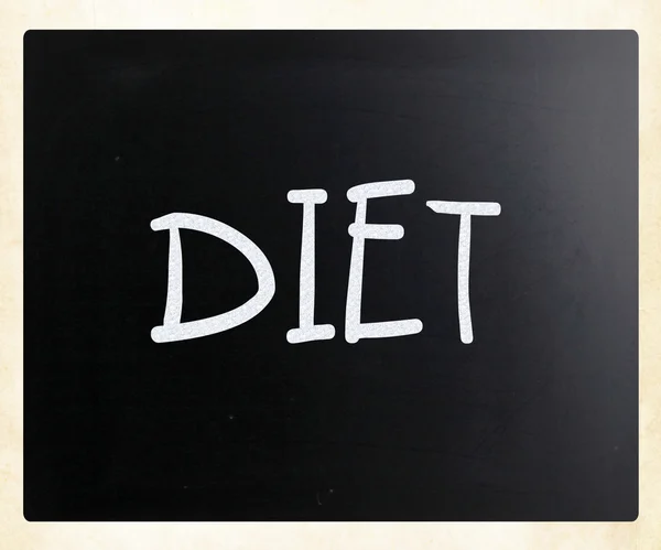 "Diet "handwritten with white chalk on a blackboard — стоковое фото