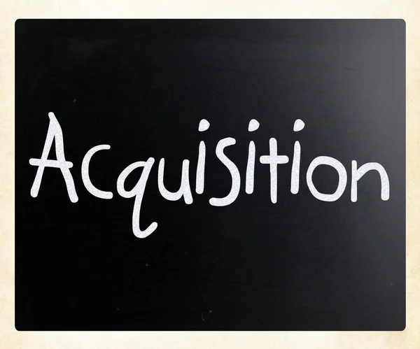 The word "Acquisition" handwritten with white chalk on a blackbo — Stock Photo, Image