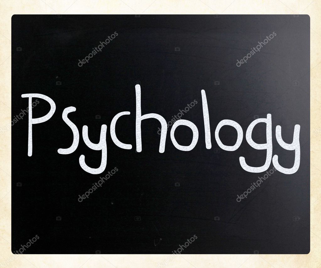 The word 'Psychology' handwritten with white chalk on a blackboa