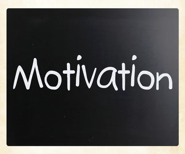 "Motivation "handskriven med vit krita på en svart tavla — Stockfoto