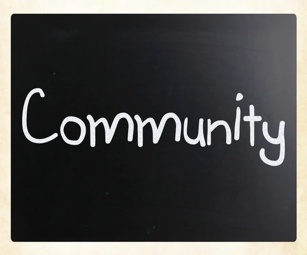 "Community "handgeschreven met wit krijt op een Blackboard — Stockfoto