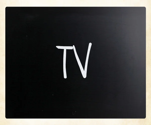 "Tv" bir tahta üzerinde beyaz tebeşir ile el yazısı — Stok fotoğraf
