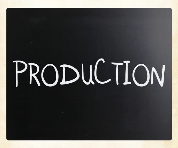 "Production" handwritten with white chalk on a blackboard — Stock Photo, Image