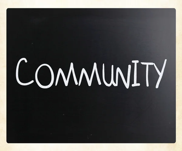 "Comunidad "escrito a mano con tiza blanca en una pizarra — Foto de Stock