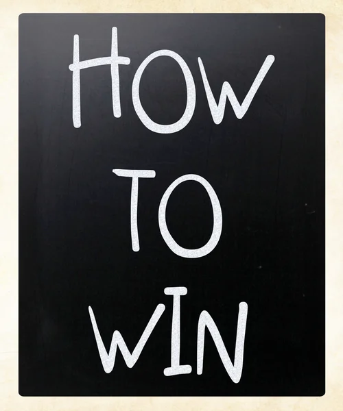 "How to win" handwritten with white chalk on a blackboard — Stock Photo, Image