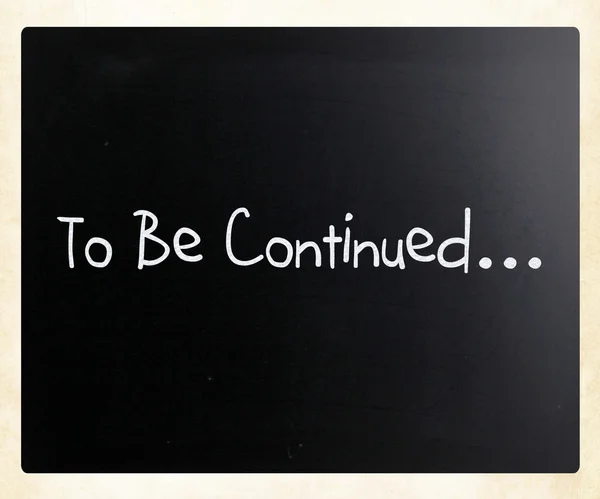 "To be continued" handwritten with white chalk on a blackboard — Stock Photo, Image