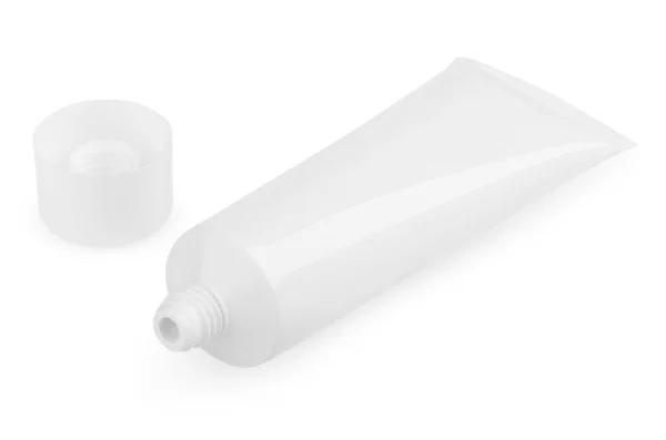 Tubo cosmetico bianco aperto con crema isolata su bianco — Foto Stock