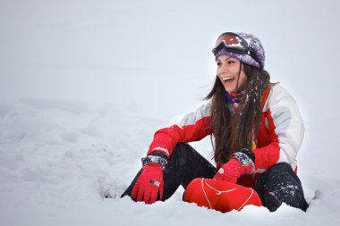 Young woman having fun in winter clipart
